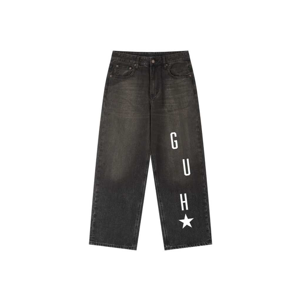 Black jeans with 'G U H' text and star on a white background
