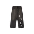 Black jeans with 'G U H' text and star on a white background