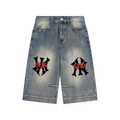 Denim shorts with black and red logos on a white background