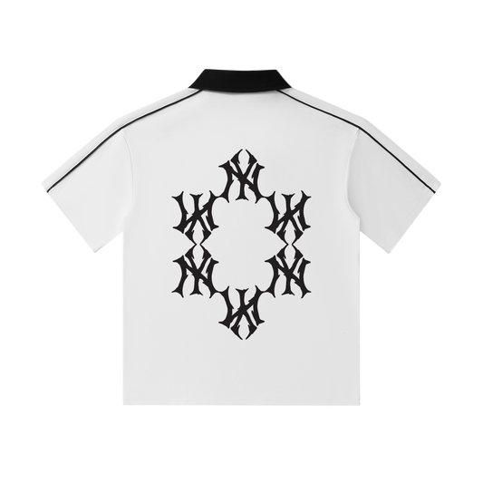 White shirt with black geometric pattern on a white background